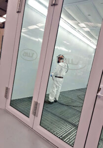 AW spray booth installed by Junair featuring logo